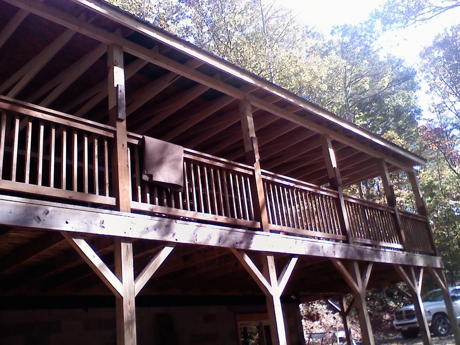 Timber framing under a new elevated porch and deck — Roof Leak Repair in Kenyon by Roofing Brothers